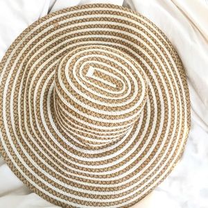 Eric Javits beach hat with white stripes